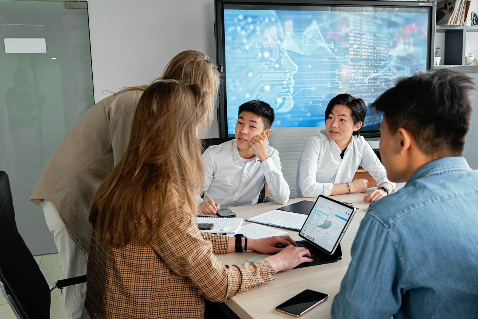 Team meeting discussing delivery
